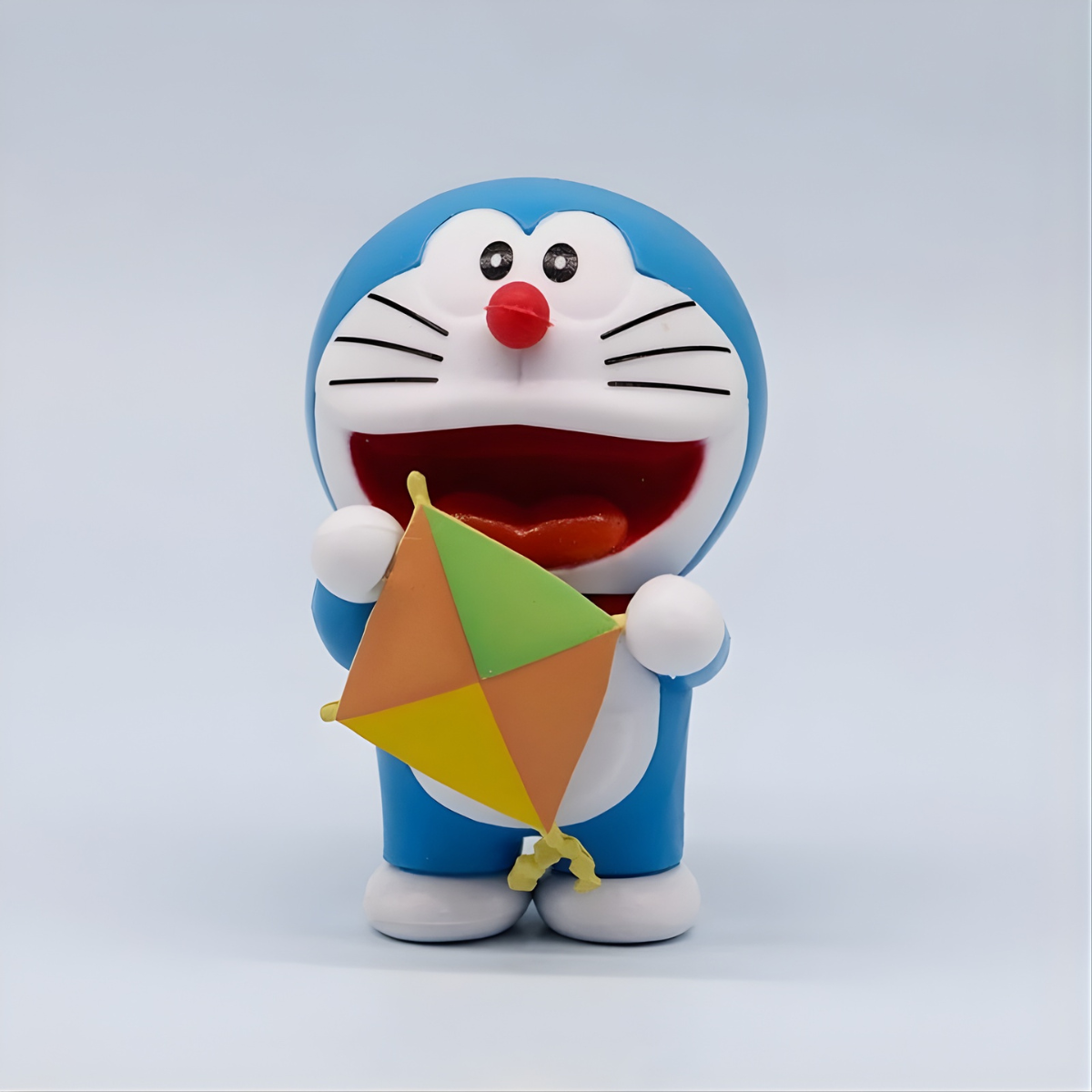 Doraemon Character Holding a Colorful Kite - Tinyminymo