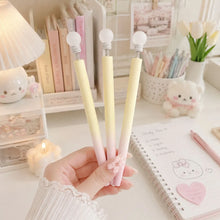 Load image into Gallery viewer, Three Yellow Bulb Pens Held by a Hand - Tinyminymo