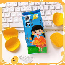 Load image into Gallery viewer, Packaged Blue Chips Eraser on a keyboard - Tinyminymo