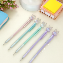 Load image into Gallery viewer, Crystal Bunny Mechanical Pencil placed on a Light Background - Tinyminymo