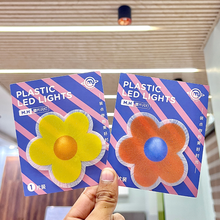 Load image into Gallery viewer, Two Pieces of Cute Flower Stick on Light held by a hand - Tinyminymo