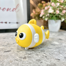 Load image into Gallery viewer, Yellow and White Fish 2 in 1 Sharpener and Eraser on a Marble Surface with Flowers in the Background - Tinyminymo