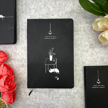 Load image into Gallery viewer, Kitty under the Table Design of Black Page Notebook - Tinyminymo