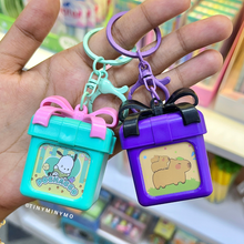 Load image into Gallery viewer, Two Light Up Kawaii Keychain with Pochacco and Capybara Print - Tinyminymo