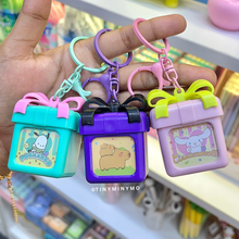 Load image into Gallery viewer, Three Colors of Light Up Kawaii Keychain with Cinnamoroll, Pochacco and Capybara Print - Tinyminymo