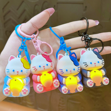 Load image into Gallery viewer, Four Different Coloured Lightup Cat Keychains with Yellow Lightning Fish Held by a Hand - Tinyminymo