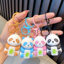 Load image into Gallery viewer, Four Colorful Panda Keychains in one Hand - Tinyminymo