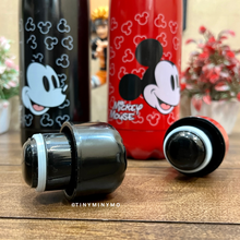 Load image into Gallery viewer, Two Metallic Bottles with Mickey Mouse Designs on a Wooden Surface, One in Black and the Other in Red - Tinyminymo