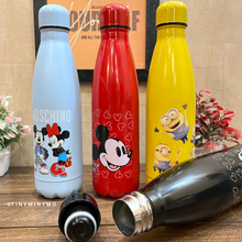 Load image into Gallery viewer, Four Colorful Metallic Bottles with Cartoon Designs Placed on a Wooden Surface - Tinyminymo