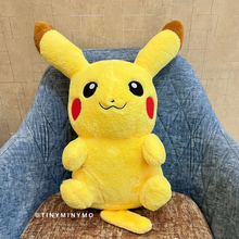Load image into Gallery viewer, Pikachu Soft Toy on a denim chair and beige wall background - Tinyminymo