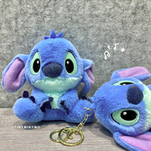 Load image into Gallery viewer, Two Blue Plush Stitch 3D Keychains on a Textured Surface - Tinyminymo