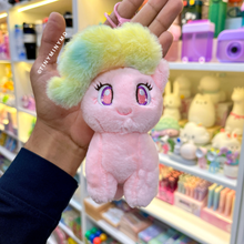Load image into Gallery viewer, Plush Unicorn Charm in Pink Color with Rainbow Hair held in a Hand - Tinyminymo