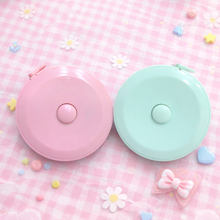 Load image into Gallery viewer, Backside of Measuring Tapes showcasing the Retract Button - Tinyminymo