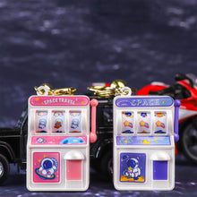 Load image into Gallery viewer, Astronaut Slot Machine Keychain - Tinyminymo
