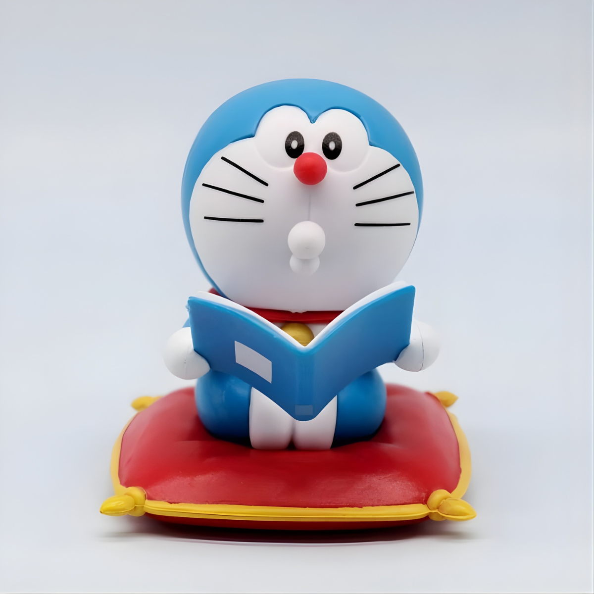 Doraemon Action Figure Sitting on a Red Cushion - Tinyminymo