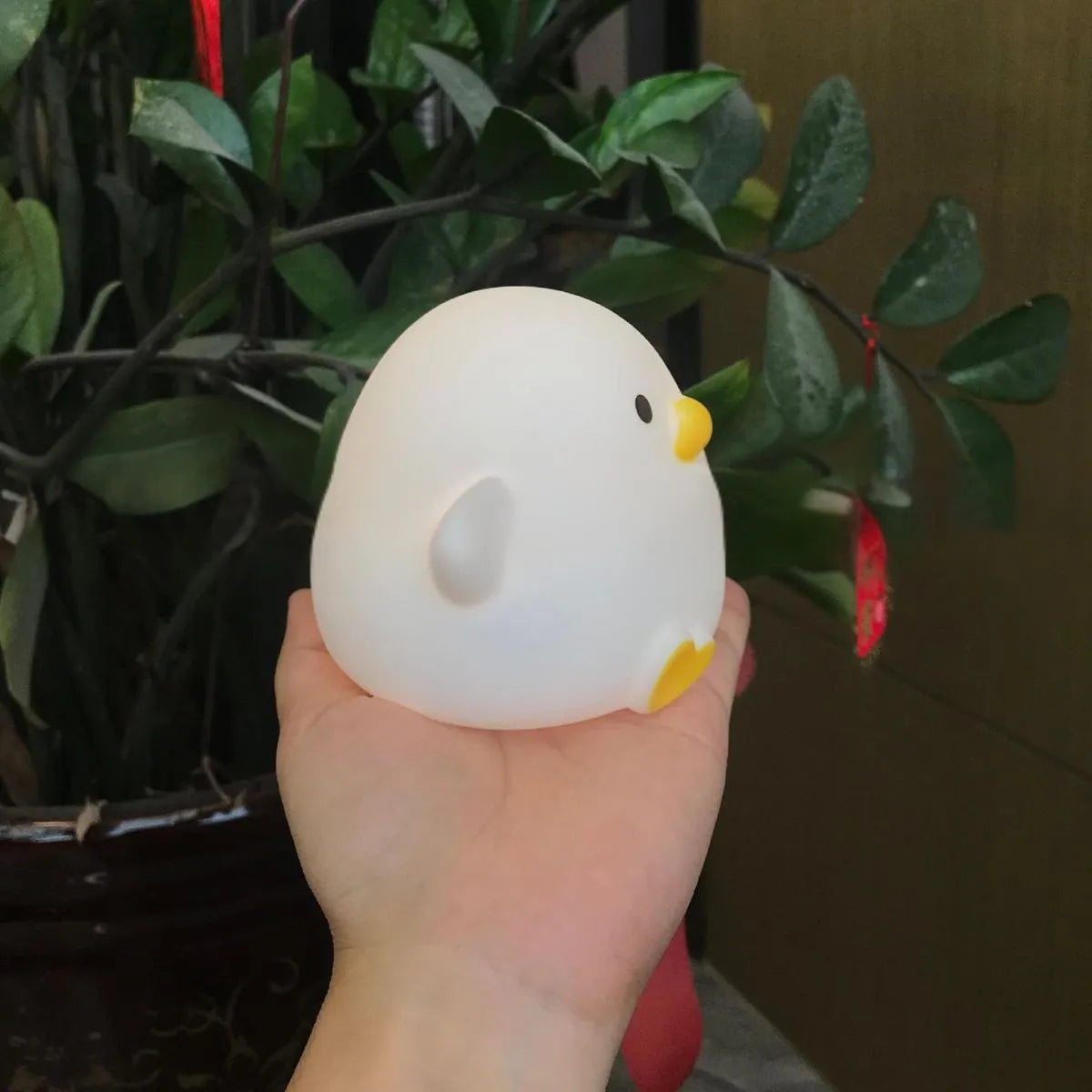 Hand holding a Cute Duck Night Light - Tinyminymo