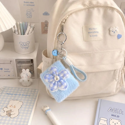 A Cute Pocket Mirror Keychain Hanging from a Bag Chain - Tinyminymo