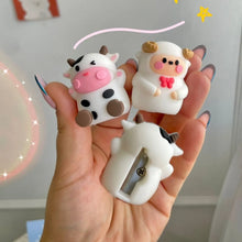 Load image into Gallery viewer, Hand Holding Two Animal Pencil Sharpeners - Tinyminymo
