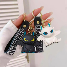 Load image into Gallery viewer, Both Designs of Baby Fury Dragon Keychains - Tinyminymo
