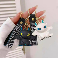 Both Designs of Baby Fury Dragon Keychains - Tinyminymo