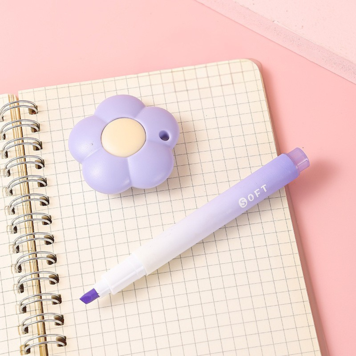 Purple Flower Shaped Paper Cutter and Highlighter Kept on a Notebook - Tinyminymo