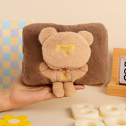 Brown Bear Electric Furr Hot Water Bag held in a Hand - Tinyminymo.