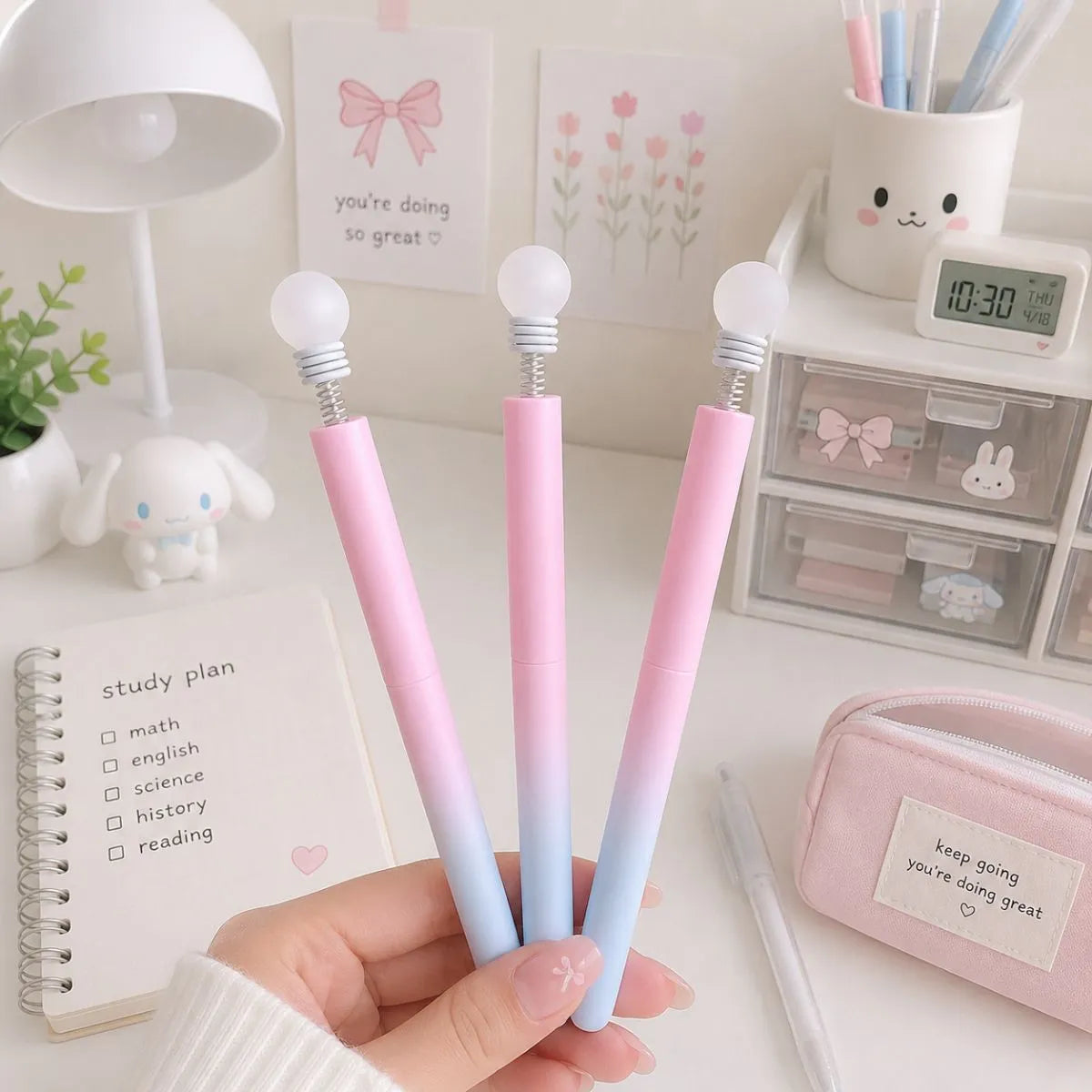 Three Pink Pens Held by a Hand - Tinyminymo