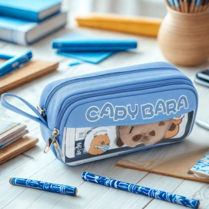 Blue Capybara Pencil Pouch with stationery items around - Tinyminymo