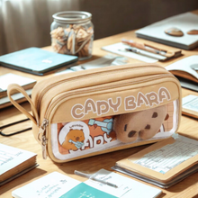 Load image into Gallery viewer, Pencil case with &#39;Capybara&#39; design on a desk in Beige Color - Tinyminymo
