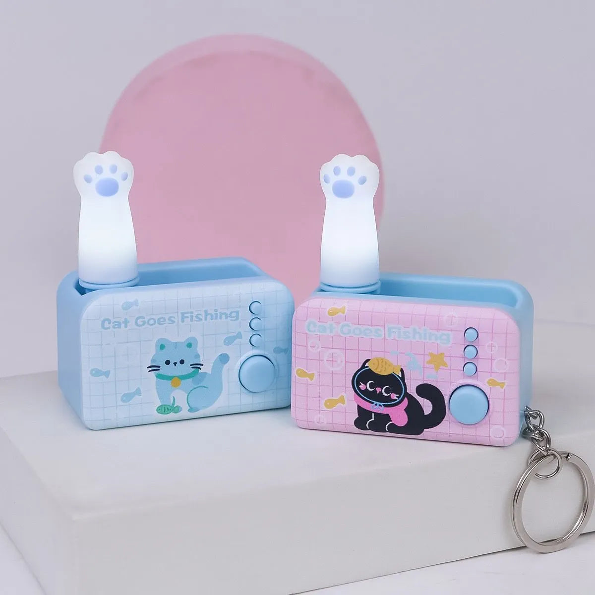 Two Cat Claw Light Keychains with Lights on - Tinyminymo