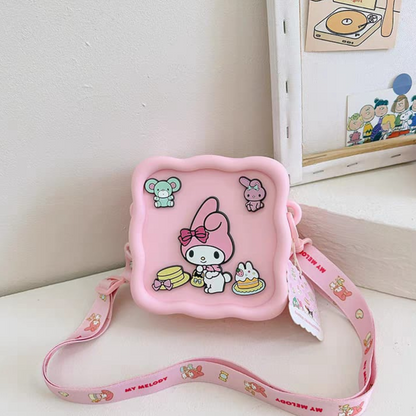 Pink Character Silicone Sling Bag featuring a Sanrio Character on a White Surface - Tinyminymo
