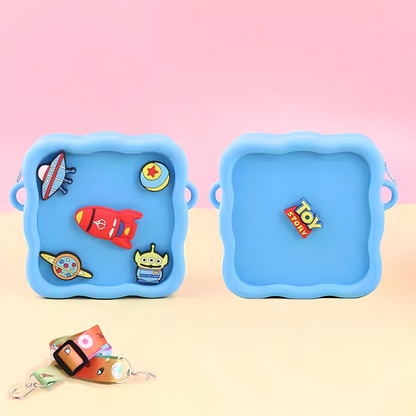 Toy Story Themed Character Silicone Sling Bag on a Pink and Beige Gradient Background - Tinyminymo