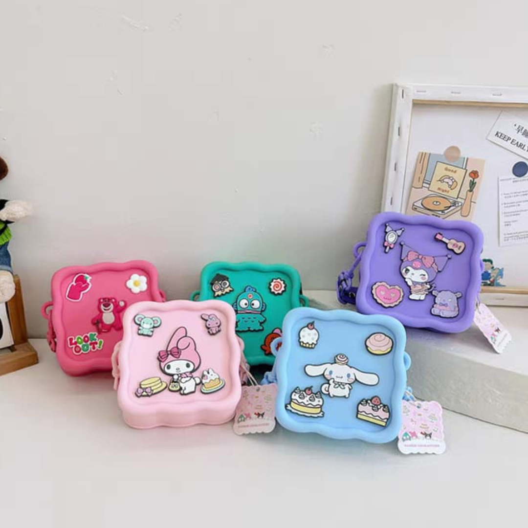 Set of Colorful Character Silicone Bags with Sanrio Designs on a White Surface - Tinyminymo