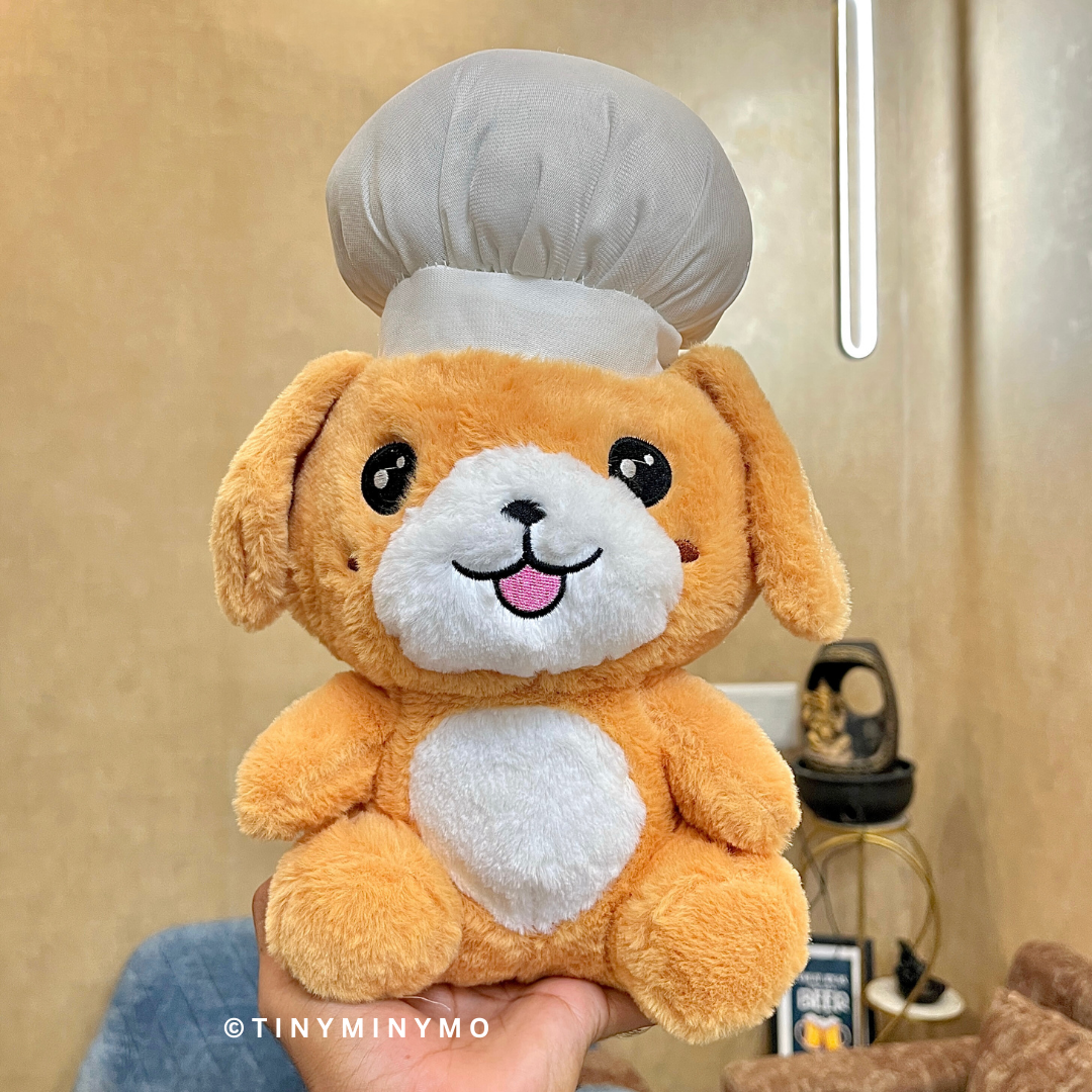 Chef Puppy Soft Toy held in Front of a Neutral Background - Tinyminymo