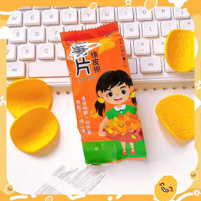 Orange packet of a Chips Eraser on a white surface - Tinyminymo