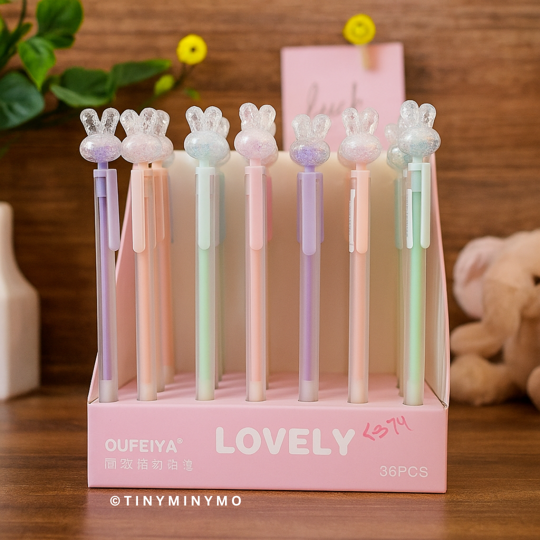 Box of Crystal Bunny Mechanical Pencil in a Pink Display Box on a Wooden Surface - Tinyminymo