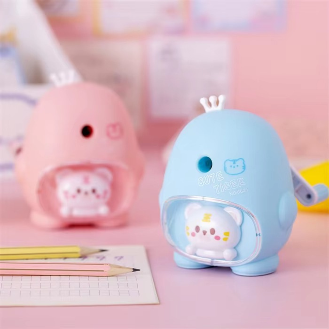 Blue and Pink Cute Animal Mechanical Sharpener alongside Pencils and Paper - Tinyminymo