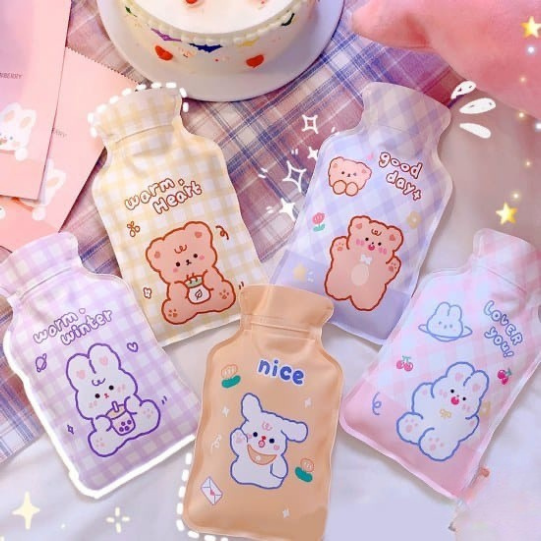 A collection of Adorable cartoon-themed Cute Hot Water Bags displayed on a Checkered Background - Tinyminymo