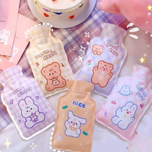 Load image into Gallery viewer, A collection of Adorable cartoon-themed Cute Hot Water Bags displayed on a Checkered Background - Tinyminymo

