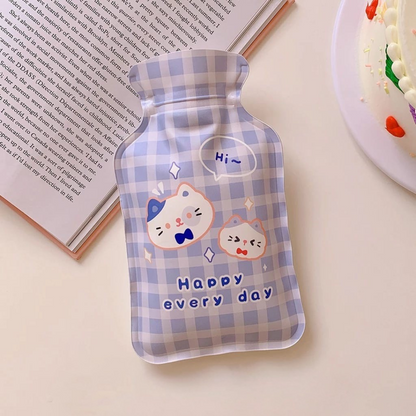 Patterned Cute Hot Water Bag with cat print on a light surface - Tinyminymo