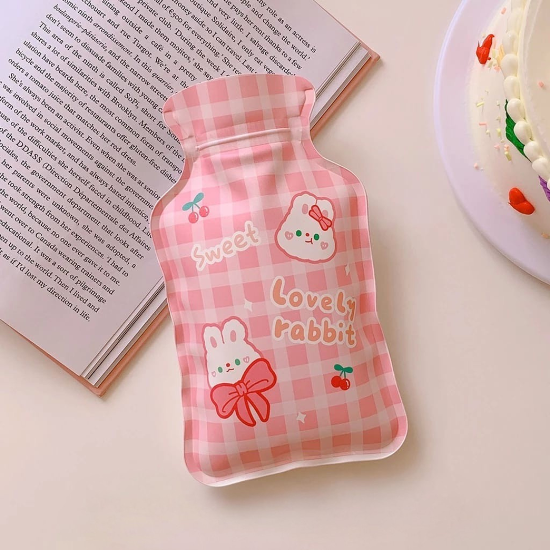 Pink checkered Cute Hot Water Bag with cartoon print on a light surface - Tinyminymo