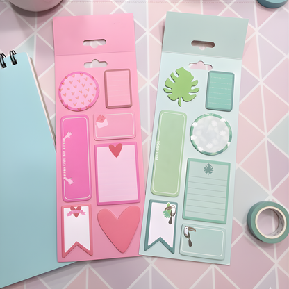 Two packs of decorative sticky notes in Pink and Green on a pink geometric patterned surface - Tinyminymo
