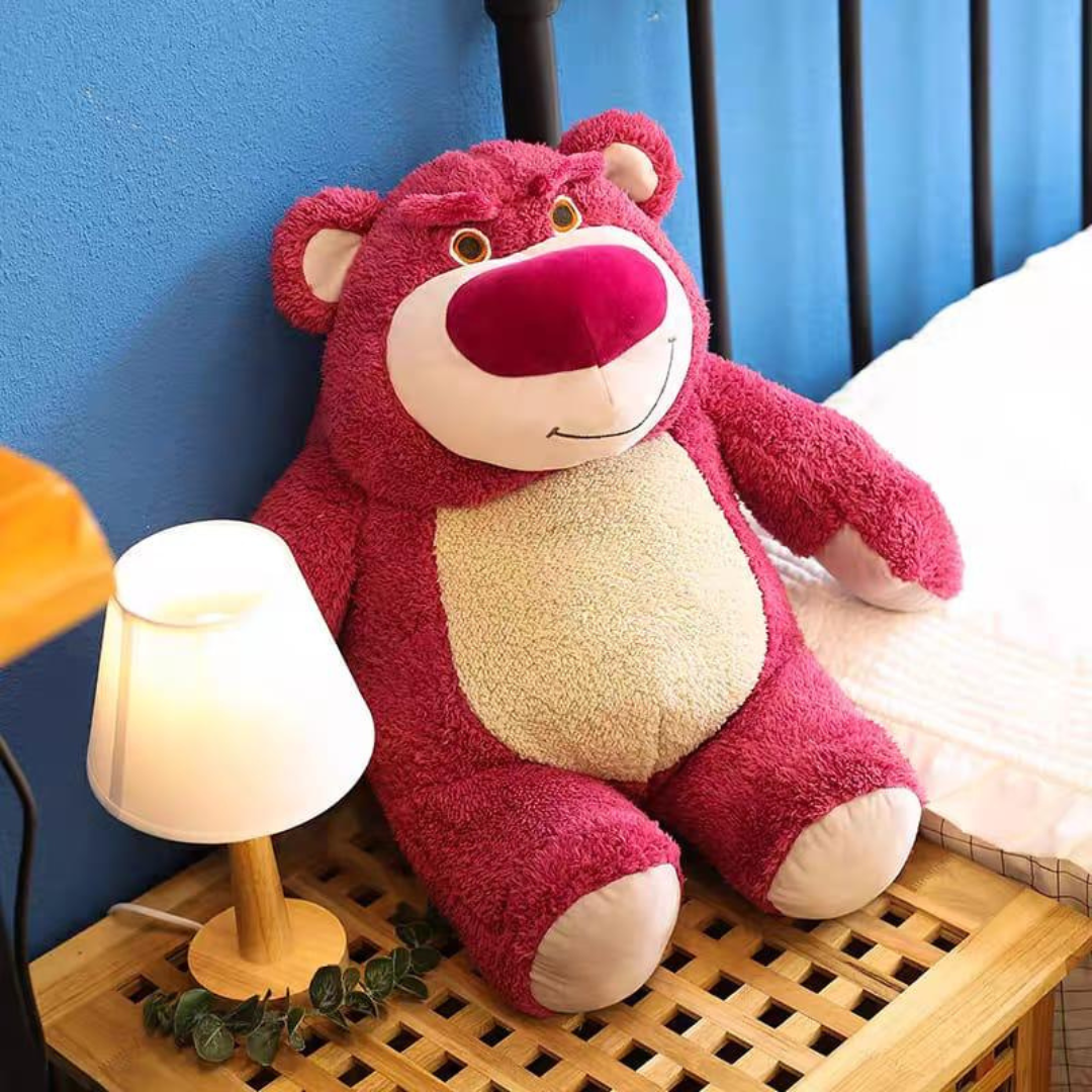 Cute Lotso Bear Soft Toy Sitting on a Wooden Surface on Bedside - Tinyminymo