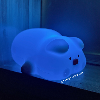 Pig Night Light in Blue, on a Wooden Surface - Tinyminymo