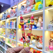 Two Red Colored Shin-chan Pens Held by Hand - Tinyminymo