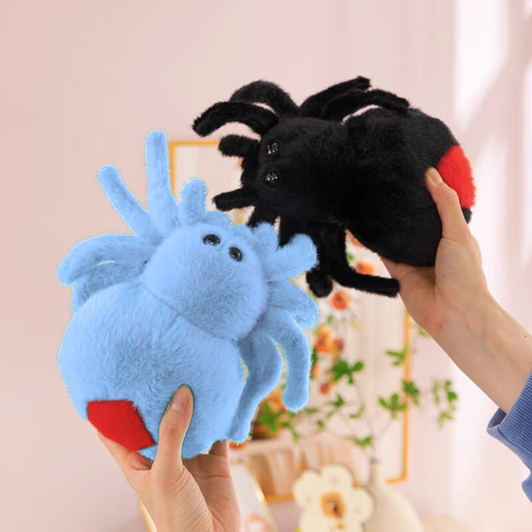 Two Cute Spider Soft Toy, one blue and one black with red accents, held by a person against a light pink background - Tinyminymo