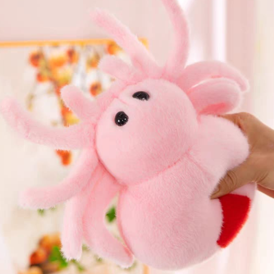 Pink Cute Spider Soft Toy held by a hand with a blurred background - Tinyminymo