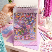 Sticker Sheet with Colorful Illustrations Held by a Hand - Tinyminymo