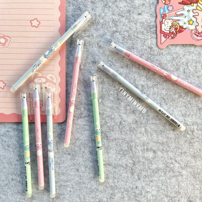Set of Colorful Dinosaur Pens with Dinosaur Print on a Grey Surface - Tinyminymo