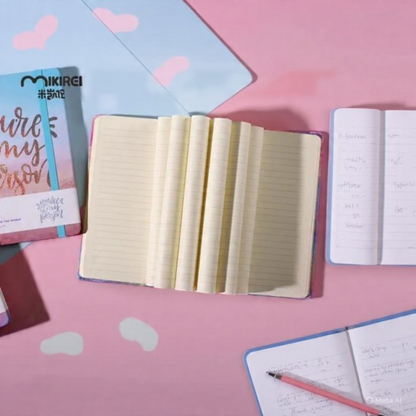 Expression Notebook kept Open on a Pink Surface - Tinyminymo
